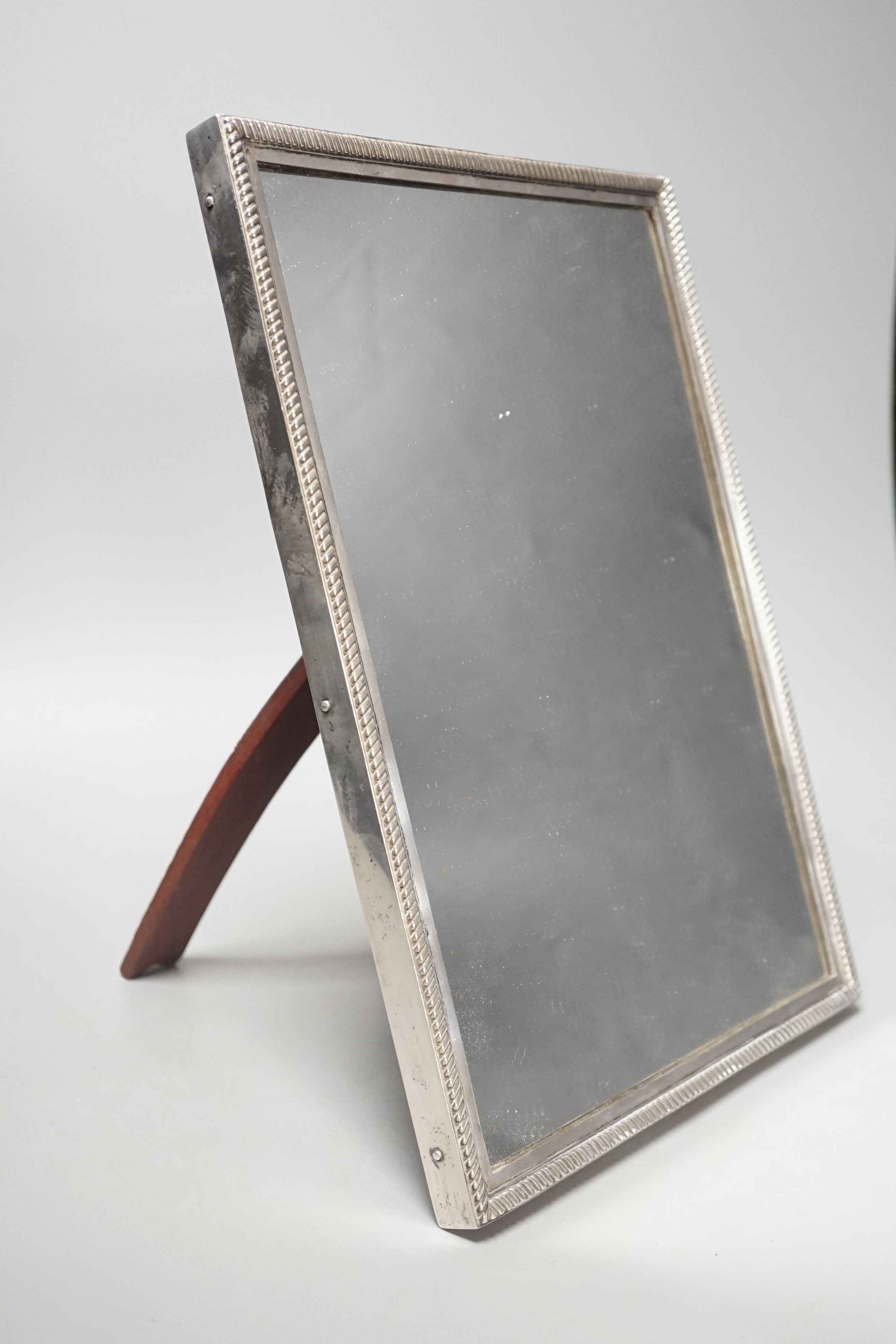 An early 20th century Russian 84 zolotnik mounted rectangular easel mirror, 33.4cm.